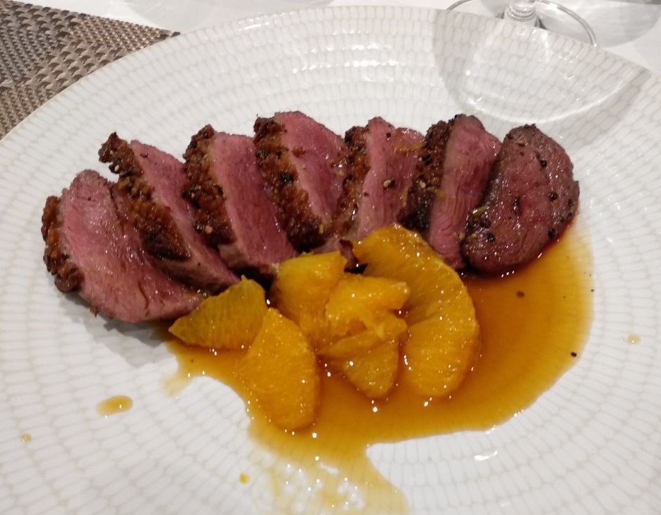 Asado de pato con jugo de cítricos
